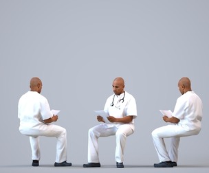 00379_Carl008 Adult Black male reading in medical facility wearing summer scrubs