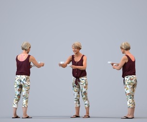 00388_Julie013 Senior Caucasian woman standing casually at home in summer clothing