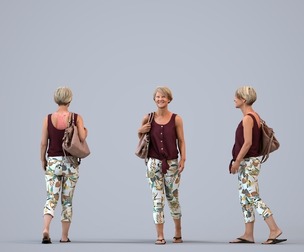 00388_Julie005 Senior Caucasian woman walking through public space with bag