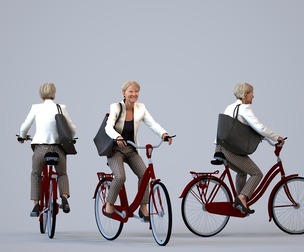 00390_Julie002 Senior Caucasian woman cycling in public wearing business attire with bag
