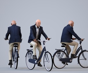 00391_James011 Senior Caucasian man cycling in public wearing business attire for transitional