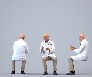 00396_James010 Senior Caucasian man talking in medical setting wearing transitional clothing