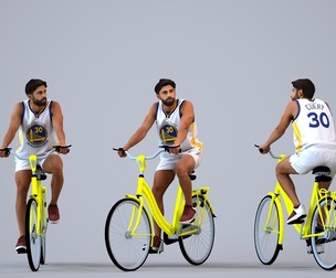 00403_Simon001 Adult Middle Eastern man cycling through public space in summer attire