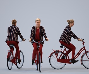 00408_Noelle012 Adult Caucasian woman cycling in public wearing transitional seasonal business
