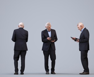 00424_Enzo007 Senior Caucasian businessman holding tablet in office wearing transitional seasonal