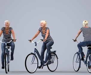 00429_Vakil018 Senior Caucasian woman cycling outdoors in casual autumn or spring attire