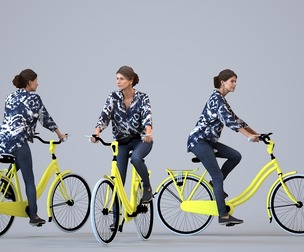 00444_Zoe001 Adult Caucasian woman cycling outdoors in casual autumn or spring attire