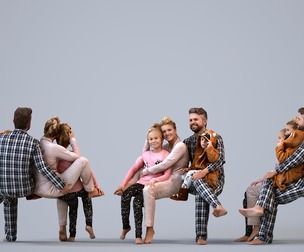 00455_Kyrsten004 Adult Caucasian woman sitting in pajamas with family and pet indoors