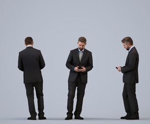 00463_Nickolas005 Adult Caucasian businessman standing in office with smartphone, autumn attire