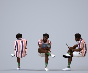 00479_Aaron0010 Adult Black male reading book at home in casual summer clothing