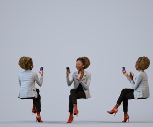 00490_Harper009 Adult Black woman sitting in office with smartphone wearing transitional business