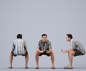 00514_Gael008 Adult Caucasian man sitting casually with gaming controller in summer home attire
