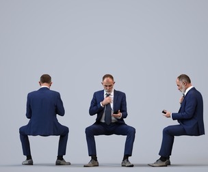 00552_Anthony011 Adult Caucasian male sitting in office with smartphone wearing autumn attire