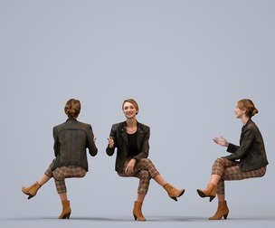 00563_Maghan013 Adult Caucasian woman talking while seated in office wearing autumn attire