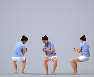 00570_Nicole012 Adult Caucasian woman sitting at home with smartphone, casual summer attire