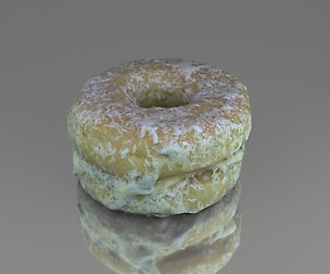 Rounded cake with cream