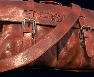 NEW AND WORN OUT RED LEATHER BAG