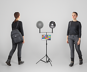 Young woman dressed in black with a backpack 111