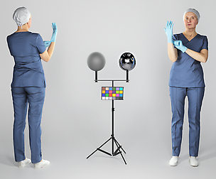 Female surgeon putting on sterile gloves 133