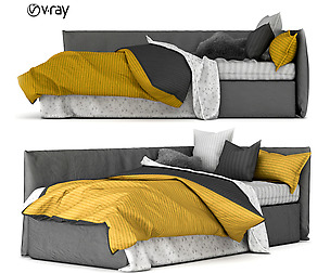 Childrens bed with decorative pillows