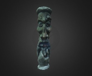 Wooden statue of a sage