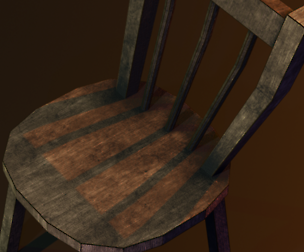 A wooden chair with scuffs and abrasions